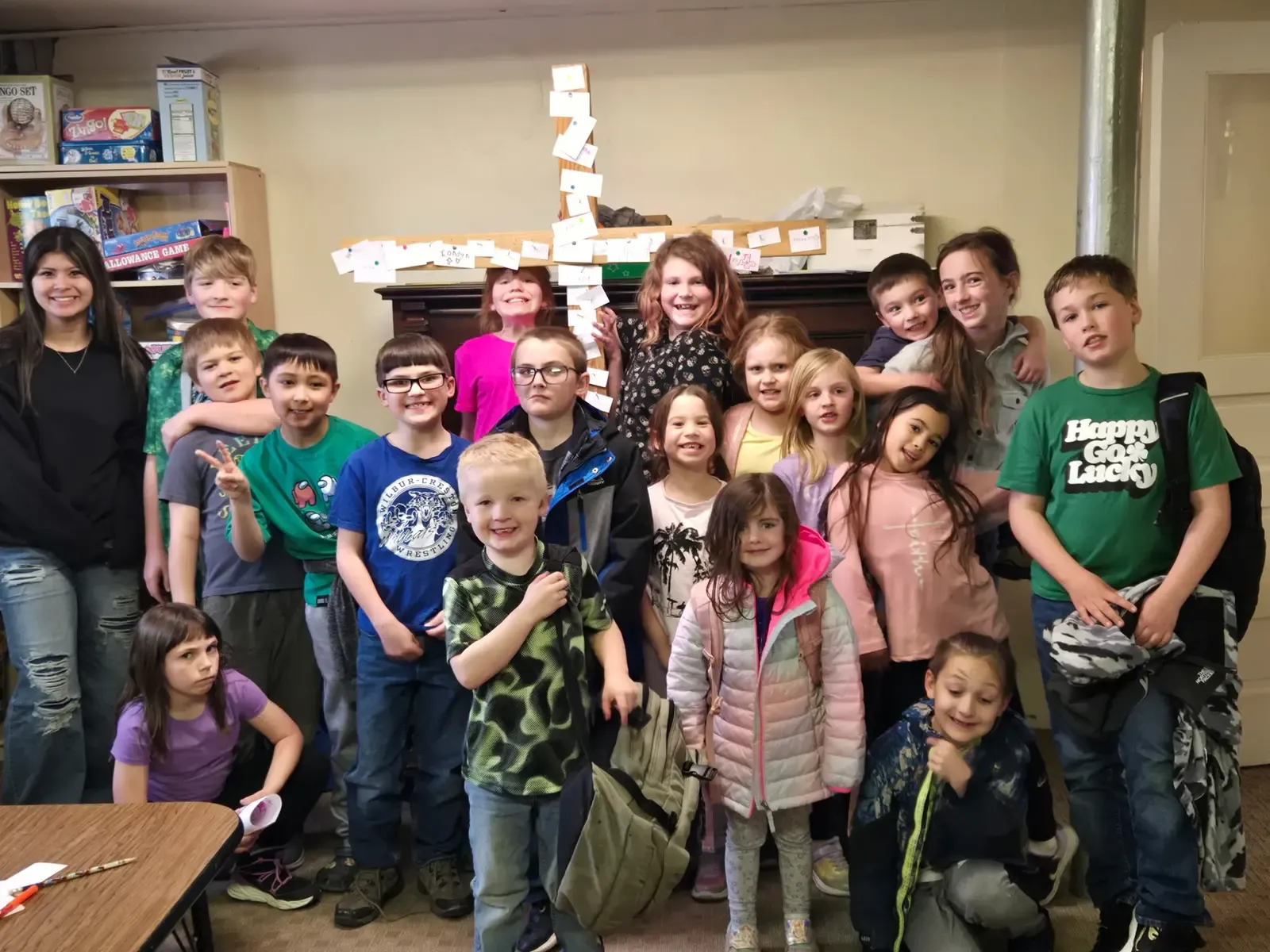 A joyful group of children with their leader at Creston Christian Church