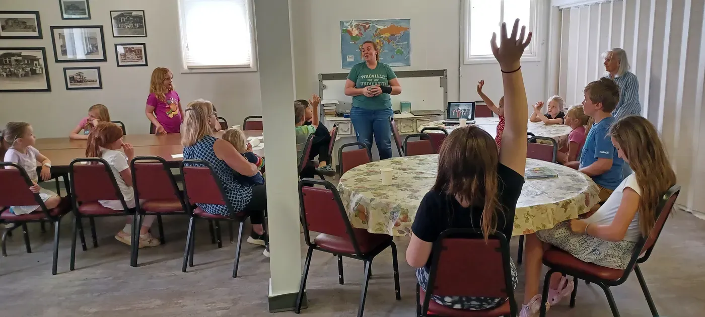 A leader teaching children in Sunday School at Creston Christian Church